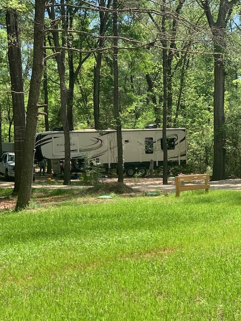 Wooded RV site with full hookups near Palestine TX at Songbird RV Park